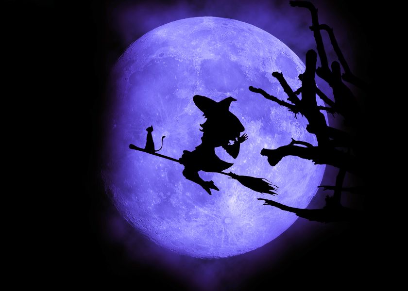 Vještica leti na metli povodom Halooweena