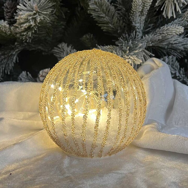 KUGLA S LED SVJETLIMA NA BATERIJE - ZLATNE GLITER LINIJE 12 cm